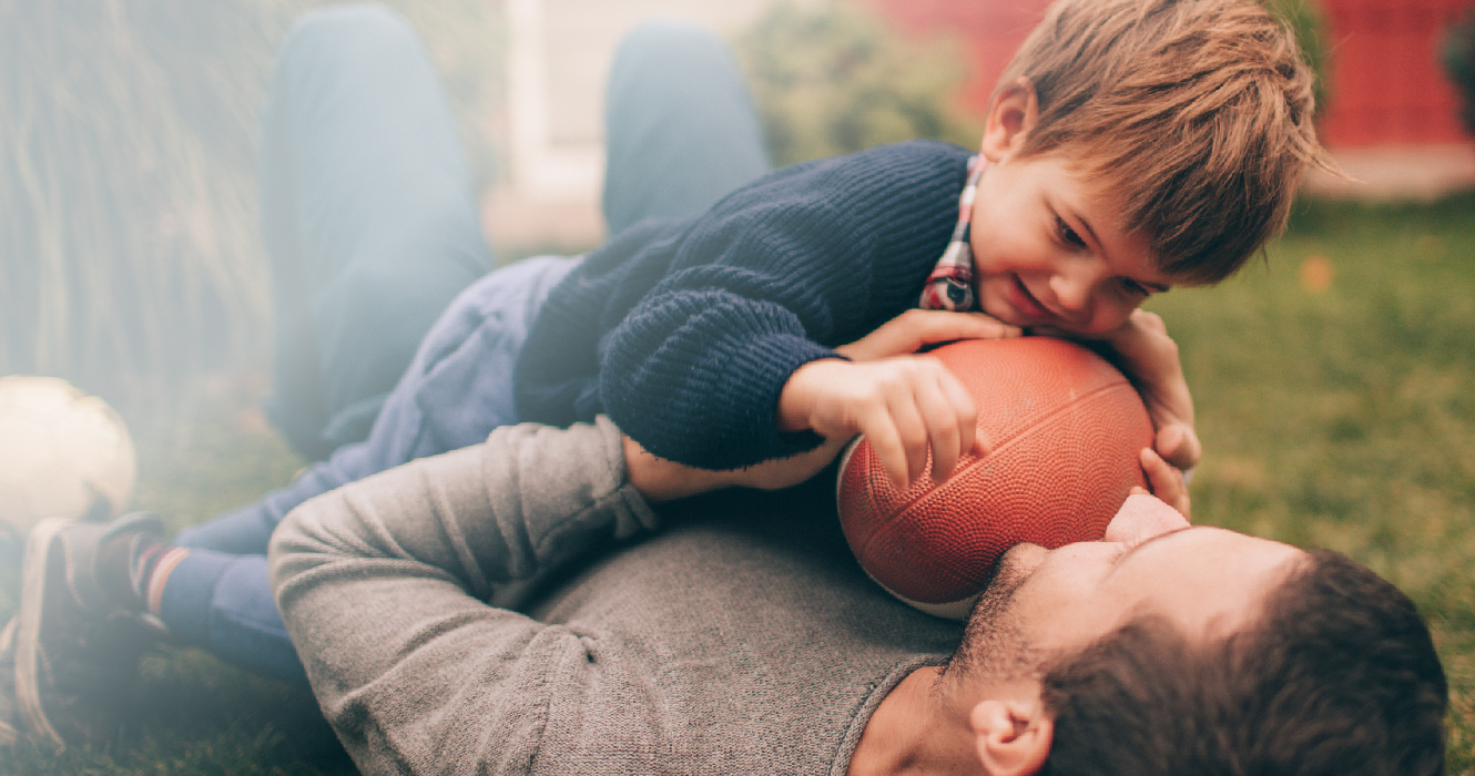 dad and son football picture